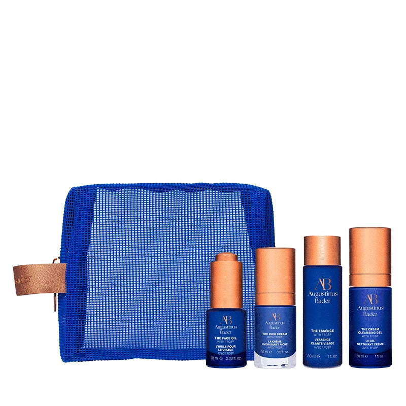 Augustinus Bader starter kit with blue mesh pouch and four skincare products