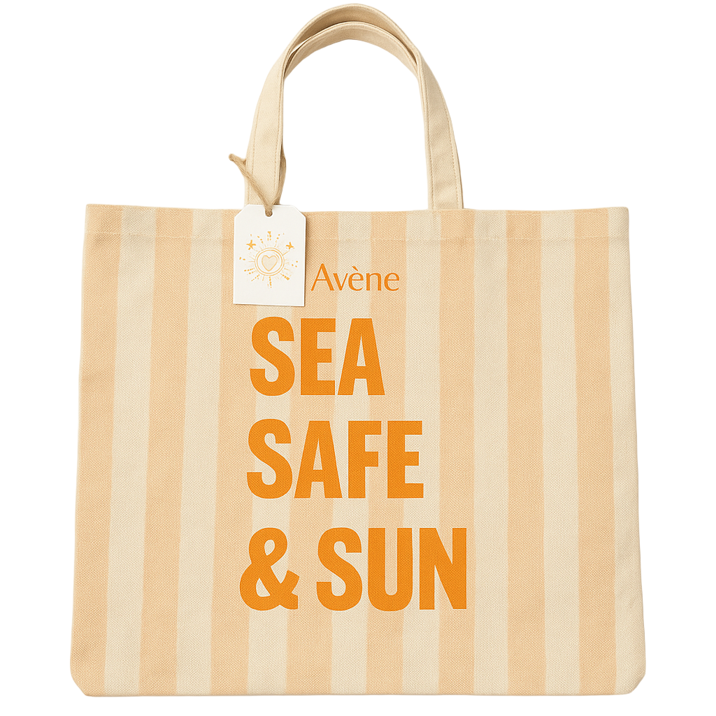 Striped tote bag with 'Sea Safe & Sun' text and Avene tag on a white background